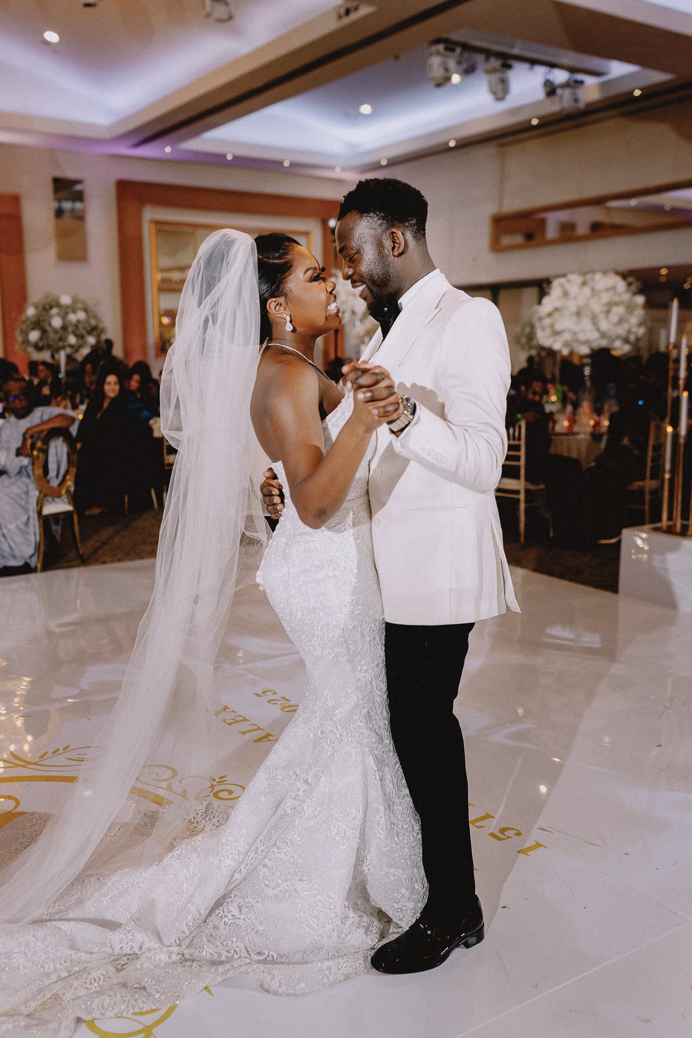 Elegant black couple's first dance at wedding reception. Wedding Photography Portfolio.