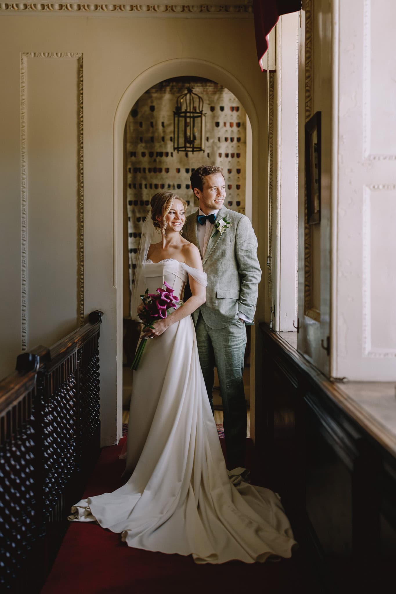 Wedding couple in a historic building, part of a wedding photography portfolio.