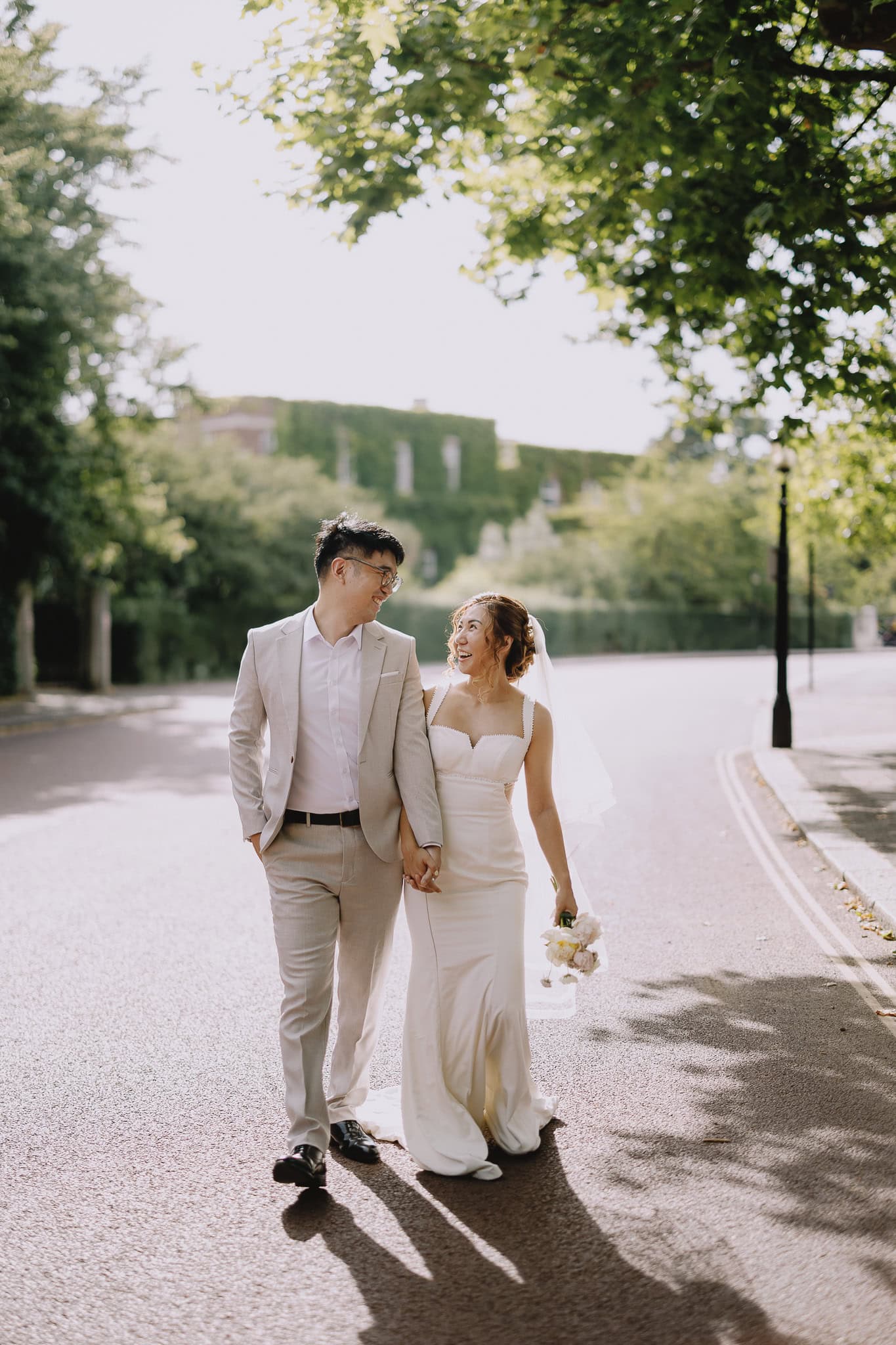 Happy couple walking on their wedding day