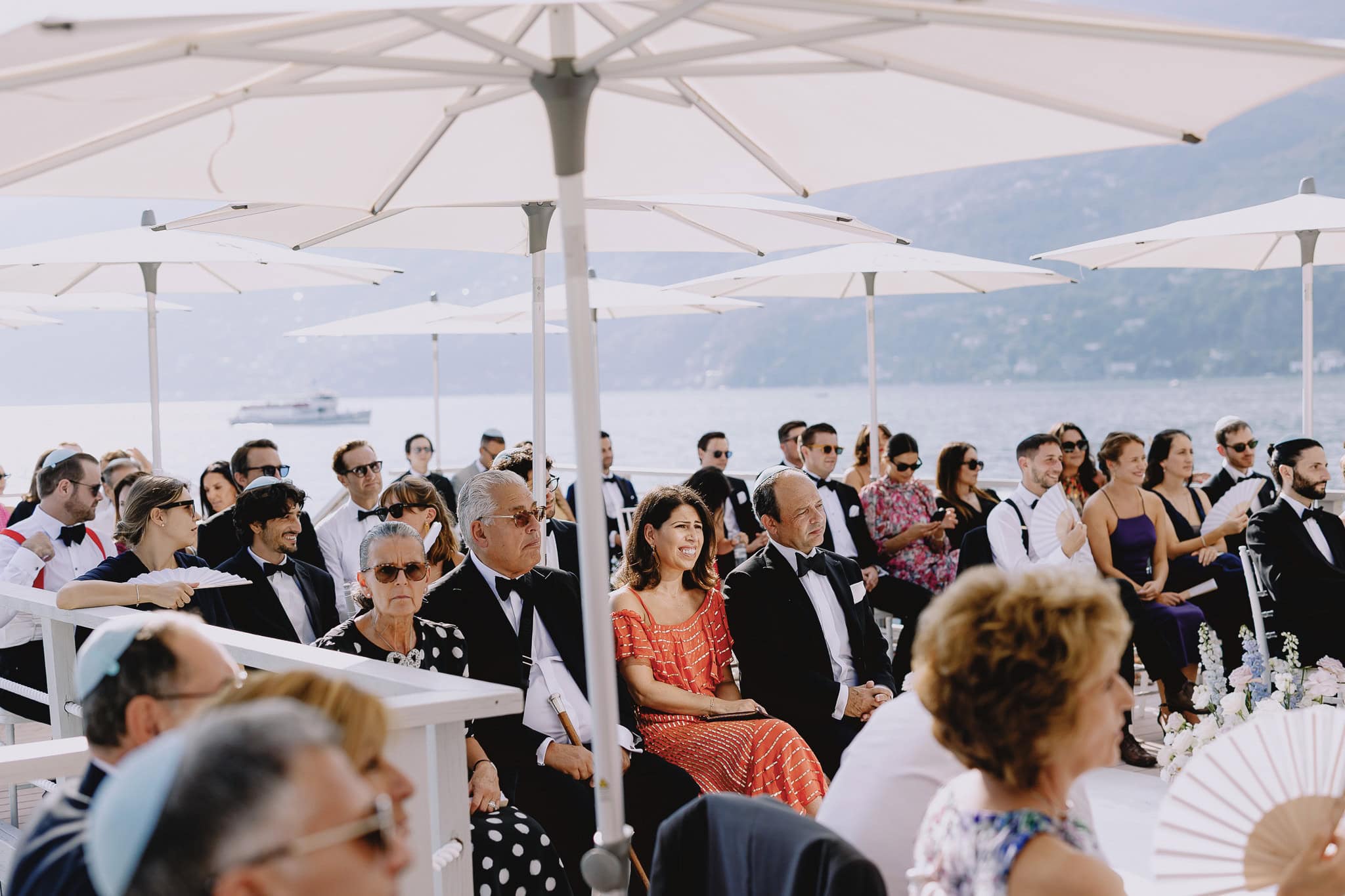 Wedding guests seated at a Lake Como wedding ceremony.