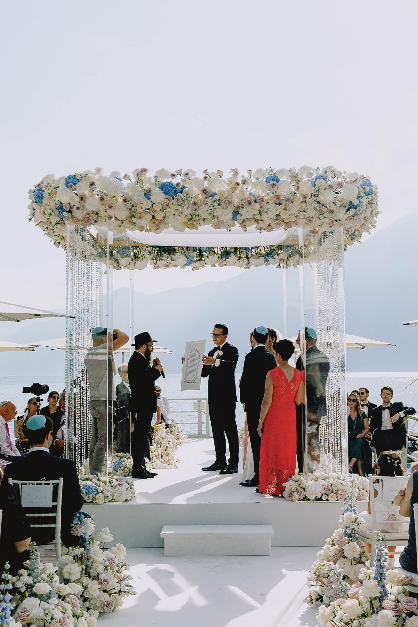 Lake Como wedding ceremony under floral chuppah