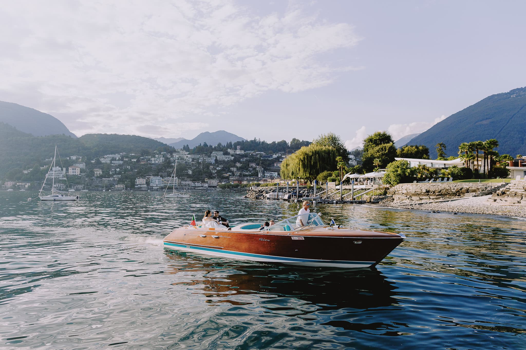 Riva boat tour on Lake Como, showcasing Italian lakes and luxury travel.